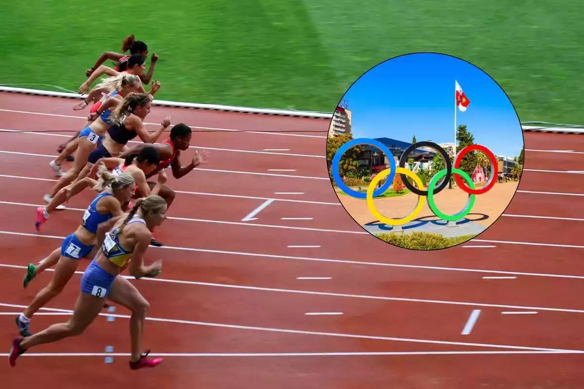 Atletes corrent al costat dels anells de les Olimpíades