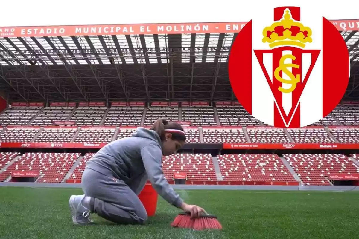 Nena netejant el terra amb l'escut de l'Sporting de Gijón