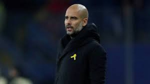 Pep guardiola lazo amarillo