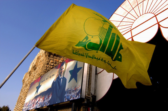 EuropaPress 5491728 april 2019 damascus syria hezbollah flag and poster of bashar assad seen at