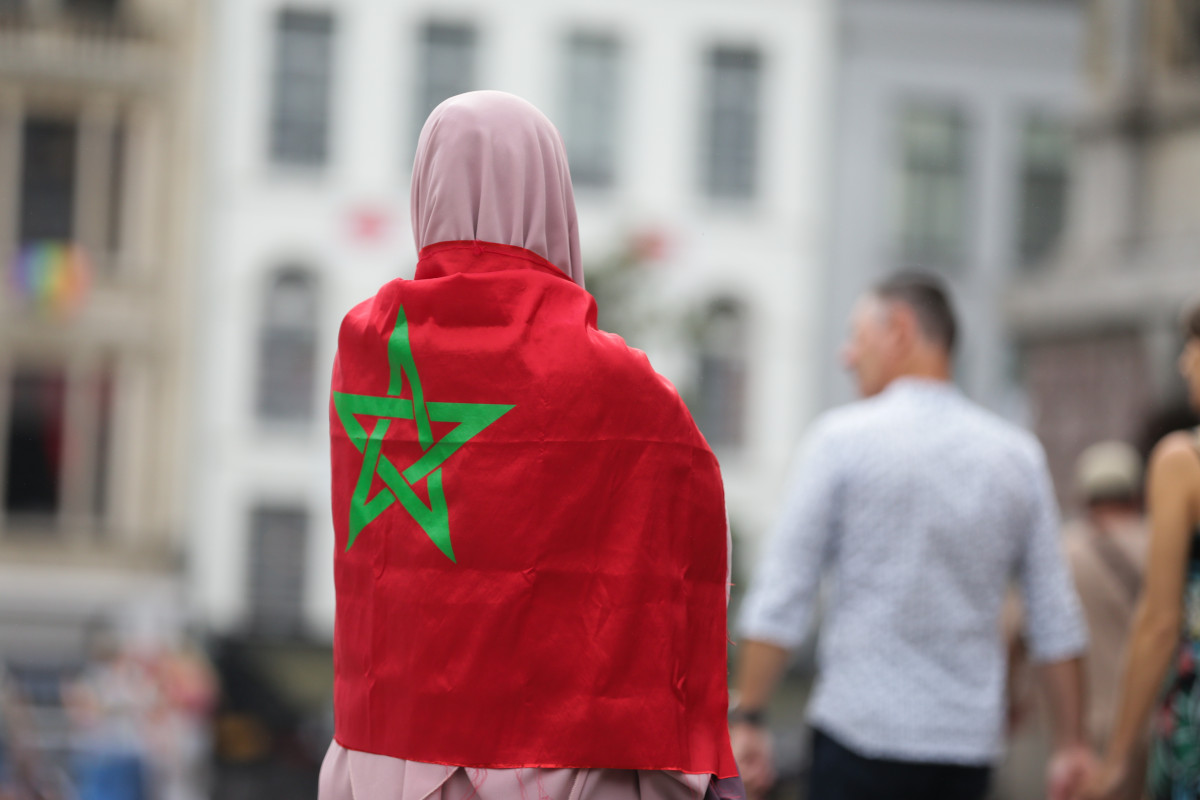 EuropaPress 5959266 antwerp belgium sept 11 2023    woman with flag of morocco attends memorial (1)