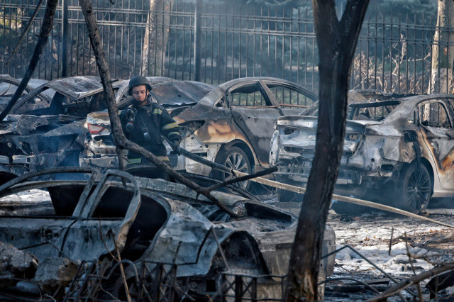 EuropaPress 6349982 18 november 2024 ukraine odesa an ukrainian rescuer stands amidst burnt out