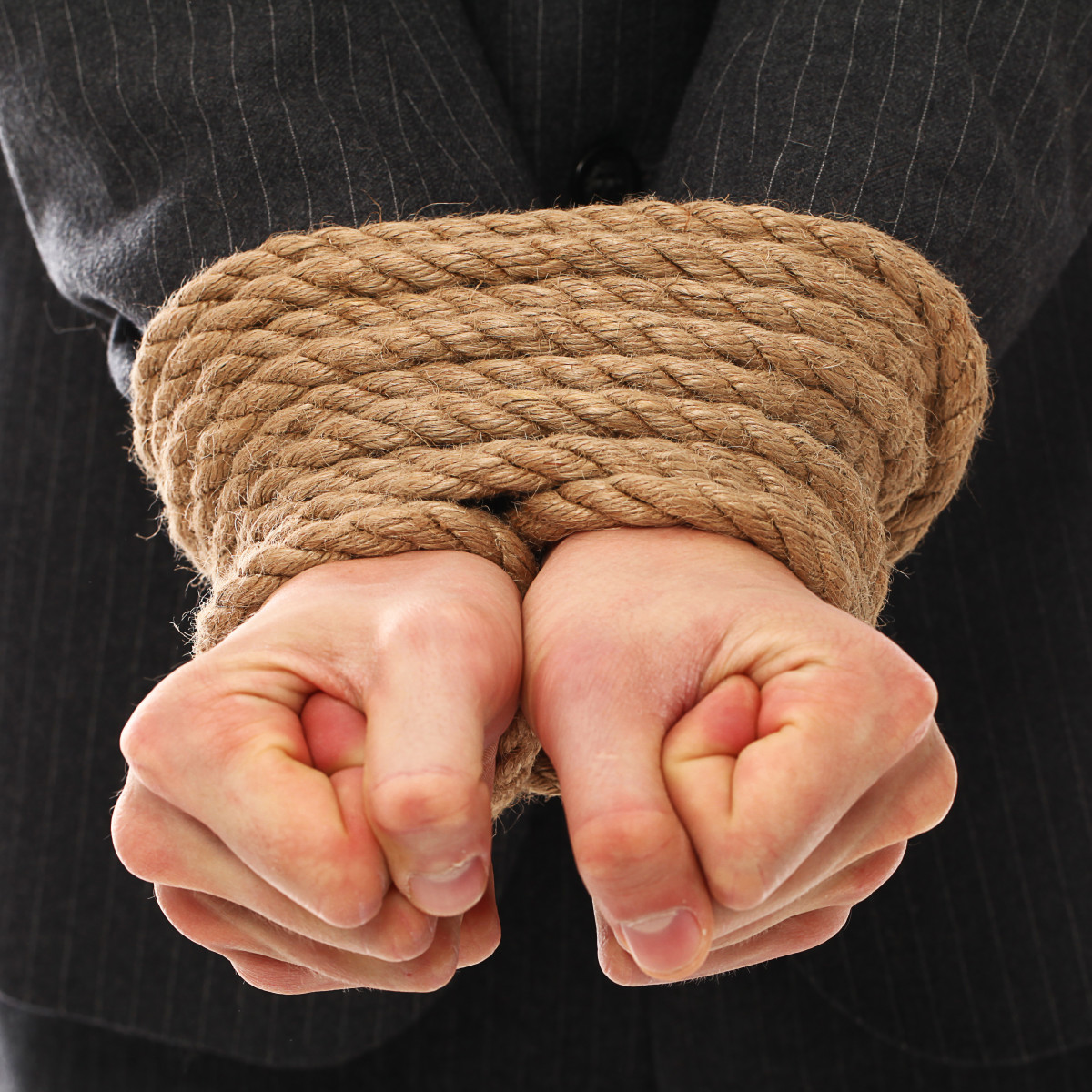 Hands young man tied with rope