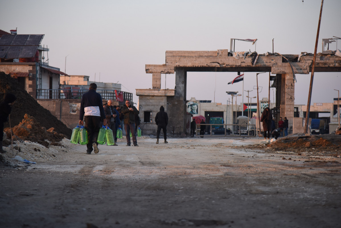 EuropaPress 6502982 al arida border crossing dec 2024    people walk near the reopened al arida