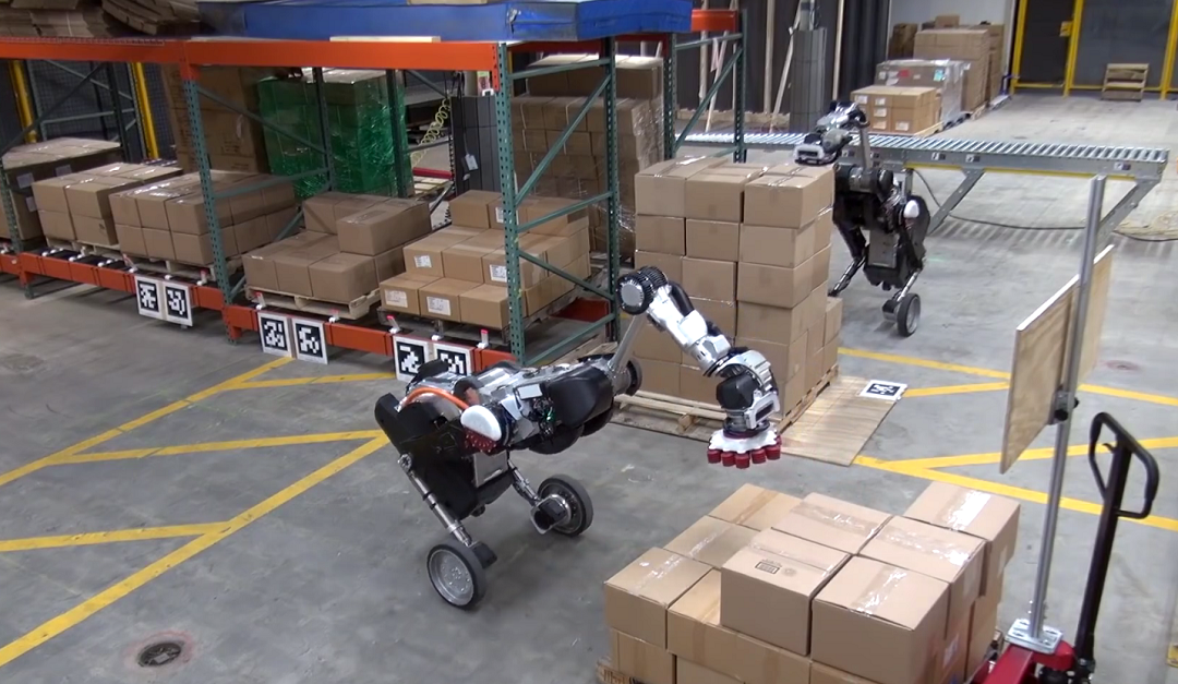 Robots de Boston Dynamics apila caixes